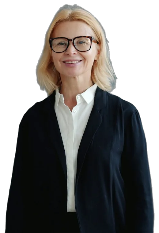 Professora de óculos, de blusa branca e casaco